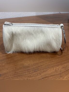 KARA Pebble Leather Duffel Wristlet Clutch Calf Hair Cowhide Off White Festival